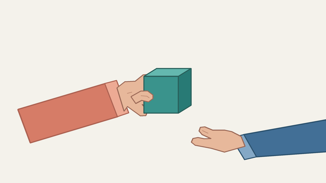 One object, two hands: support the handoff before releasing